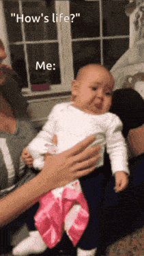 a baby is being held by a woman with the caption " how 's life me " above it