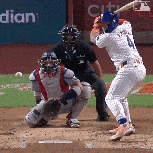 a baseball player with the number 4 on his jersey is swinging his bat