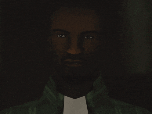 a close up of a man 's face with a dark background
