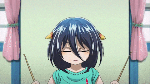 a girl with a cat ear on her head is holding a pair of drumsticks