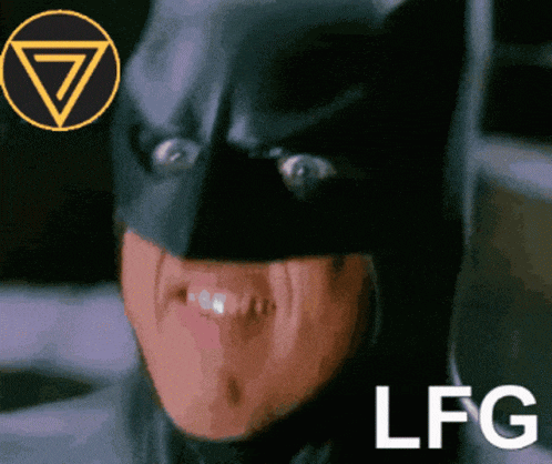 a close up of a person wearing a batman mask with the letters lfg below