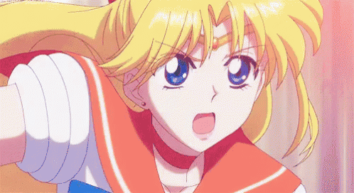 a girl with blonde hair and blue eyes is wearing a sailor moon uniform and holding a sword .