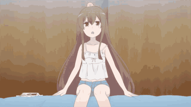 a girl with long brown hair is sitting on a bed with a yellow bird on her head