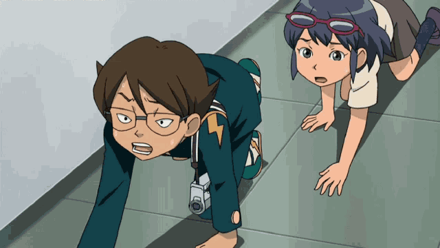 a boy with a lightning bolt on his shirt is crawling next to another boy