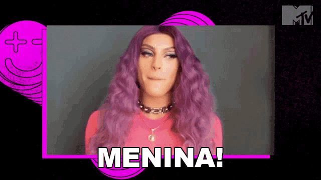 a woman with purple hair is wearing a pink shirt and necklace and says menina