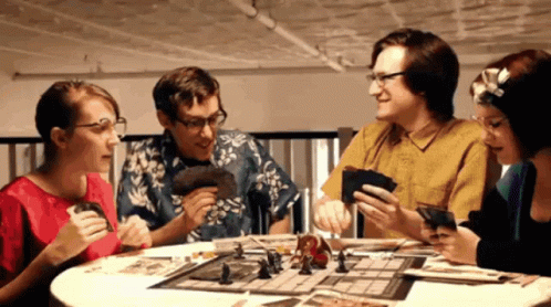Happily playing a board game.