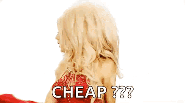a drag queen is wearing a red dress and holding a gun and saying `` cheap '' .