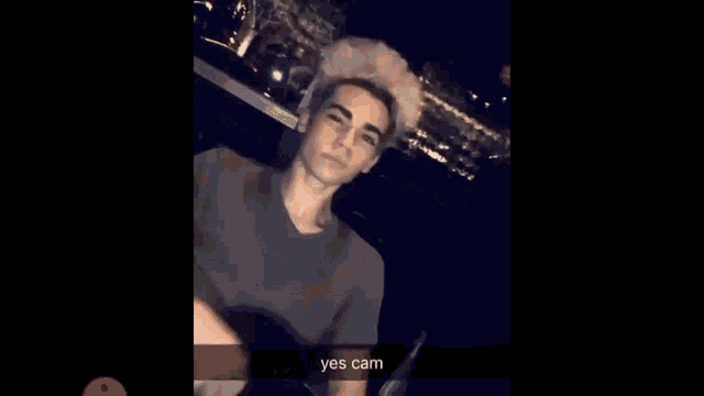 a snapchat of a man with smoke coming out of his hair and the words yes cam on the bottom