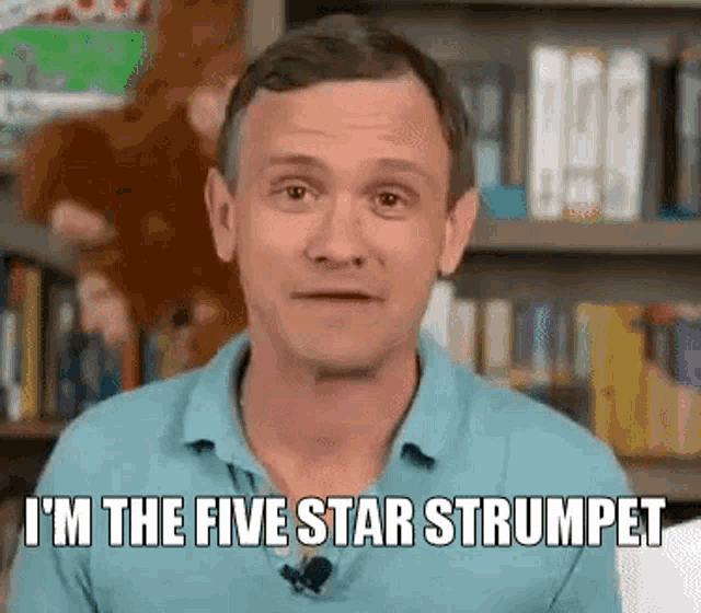 a man in a blue shirt is saying " i 'm the five star strumpet "