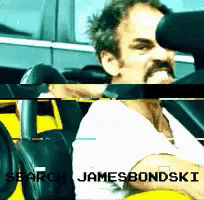 a man with a mustache is sitting in a yellow car with the name james bondski on the bottom
