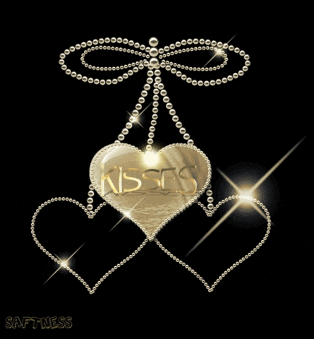 the word kisses is on the gold heart