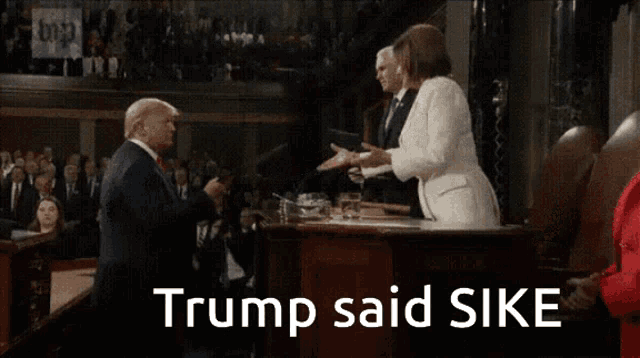 a picture of donald trump shaking hands with a woman with the caption trump said sike