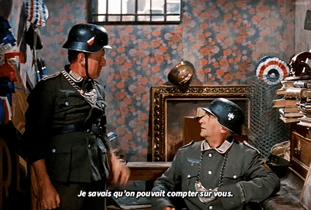two men in military uniforms are talking in a room and one of them says je savais