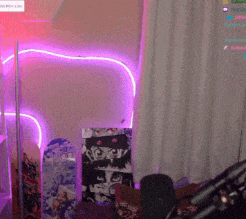 a room with purple lights and a sign that says cyber