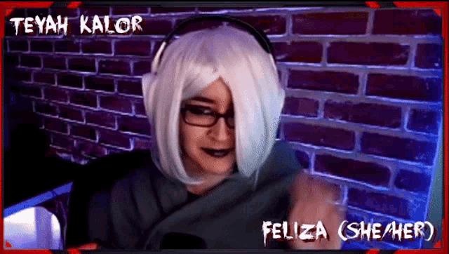a woman wearing a white wig and headphones is named felica