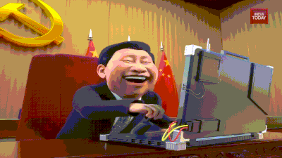 a cartoon of a man sitting at a desk with a laptop and a sign that says india today