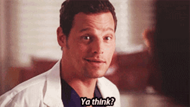 a man in a lab coat says ya think while looking at the camera