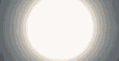 a white circle is glowing in the dark against a grey background .