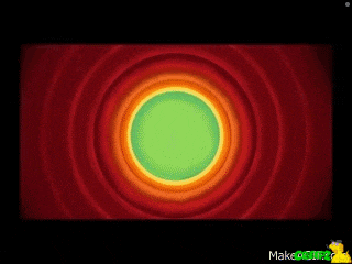 a green circle is in the middle of a red background