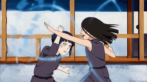 two anime girls are fighting each other in a room .