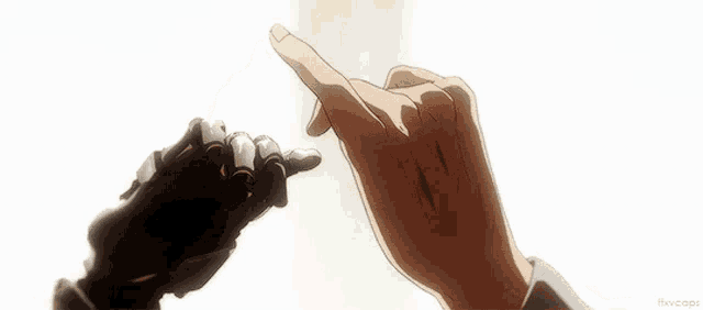a couple of hands holding each other 's fingers .