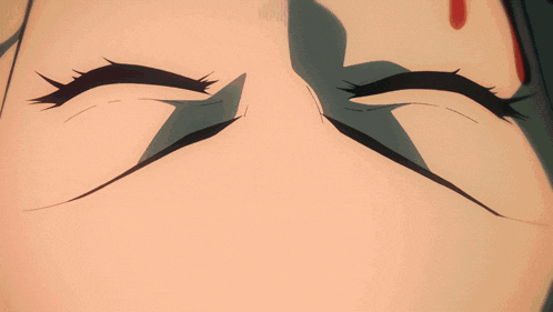 a close up of a person 's eyes that are glowing red
