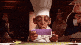 a cartoon chef is holding a piece of purple paper .