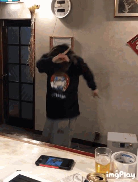 a person wearing a shirt that says ' i love you ' on it is dancing