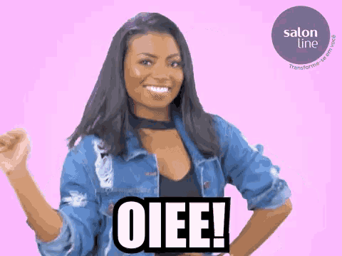 a woman wearing a denim jacket says oiee on a pink background
