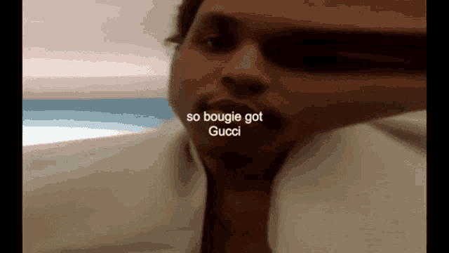 a close up of a man 's face with the words so bougie got gucci written on the bottom
