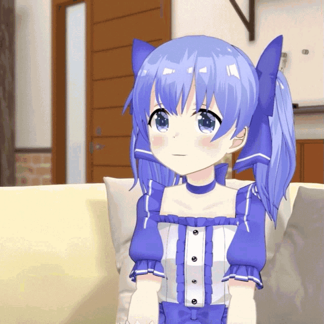 a girl with blue hair is sitting on a couch in a living room