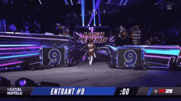 a woman is walking into a wrestling arena with a sign that says " lash legend "