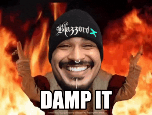 a man wearing a black beanie that says blazzard on it