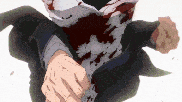 a man in a suit is holding a bloody knife in his fist