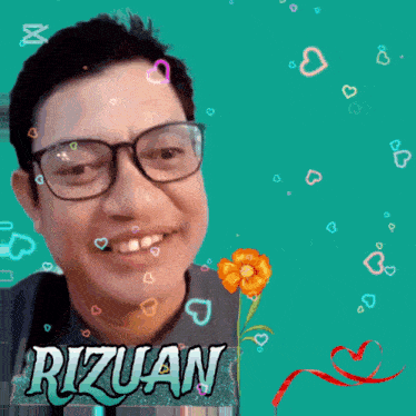 a man with glasses and the name rizuan on his shirt