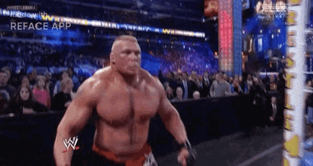 a wrestler with a reface app on his chest