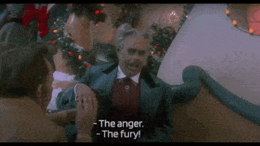 a man in a suit and tie says the anger - the fury
