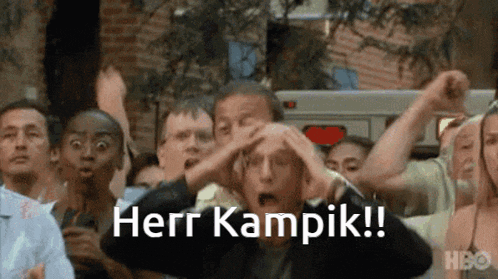 a group of people with their hands on their heads and the words herr kampik written above them
