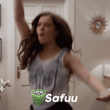 a woman wearing a safuli shirt is dancing with her arms outstretched