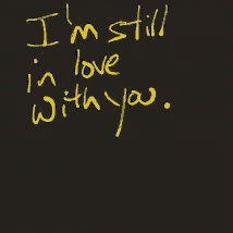 a black background with the words " i 'm still in love with you " written in yellow