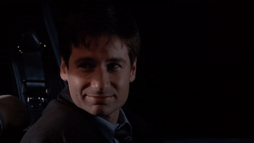 Mulder Nods Grinning The Xfiles GIF - Mulder Nods Grinning The Xfiles Nodding GIFs