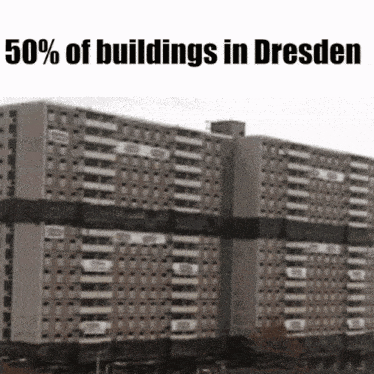 a large building with the words 50 % of buildings in dresden written above it