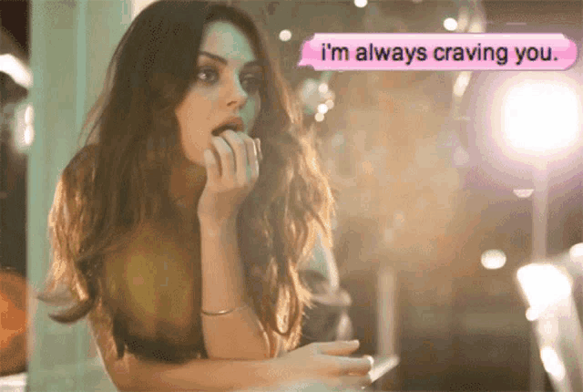 a woman with her mouth open and a sticker that says " i 'm always craving you "