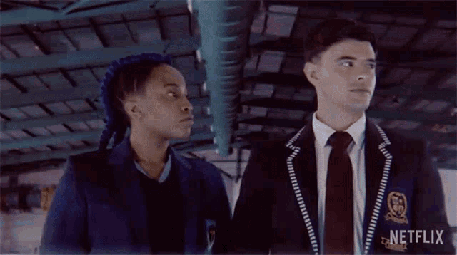 a man and a woman are looking at each other in a netflix ad .
