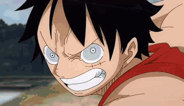 a close up of luffy from one piece with a red shirt