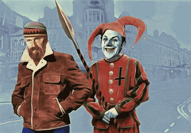 a man in a brown jacket stands next to a clown in a red outfit with a cross on it