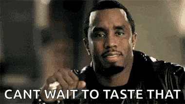 a man in a leather jacket is making a funny face and saying `` cant wait to taste that ''
