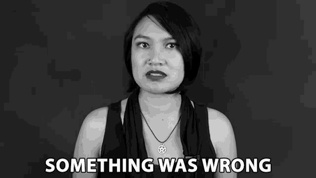 a black and white photo of a woman with the words something was wrong below her