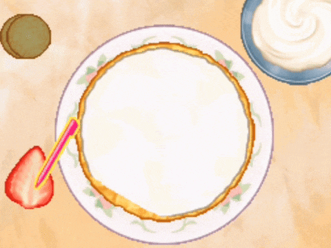 a pie with strawberries and whipped cream on top of it