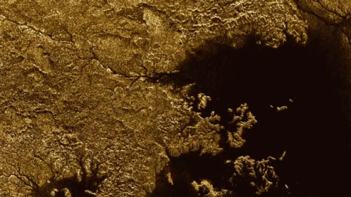 Encuentran Cayones Con Rios De Hidrocarburos En Titan La Luna De Saturno GIF - Nasa Titan Luna GIFs